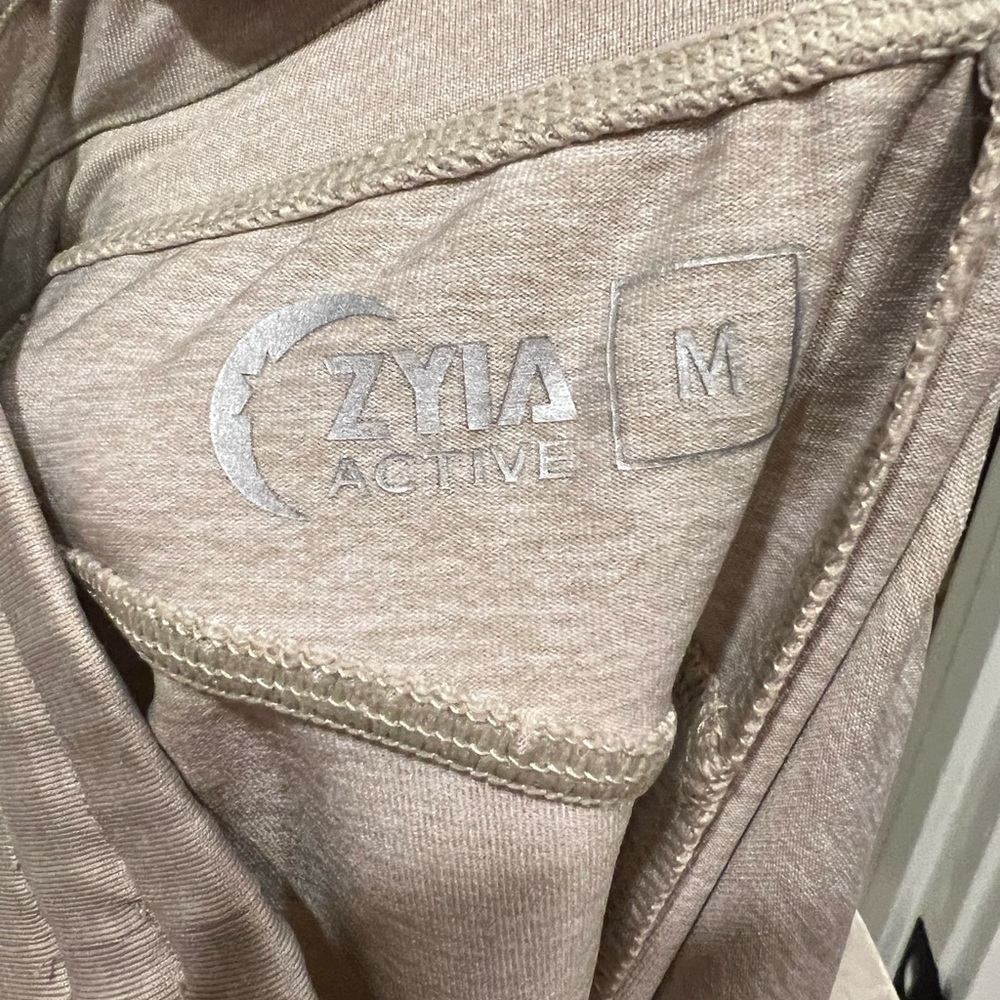Zyia joggers. Heather cream color. Never worn